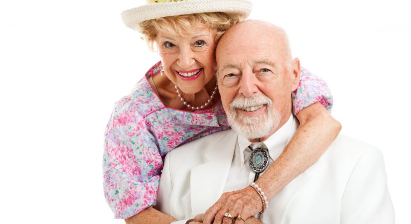 37126480 - portrait of beautiful senior couple dressed in southern style.  isolated on white.
